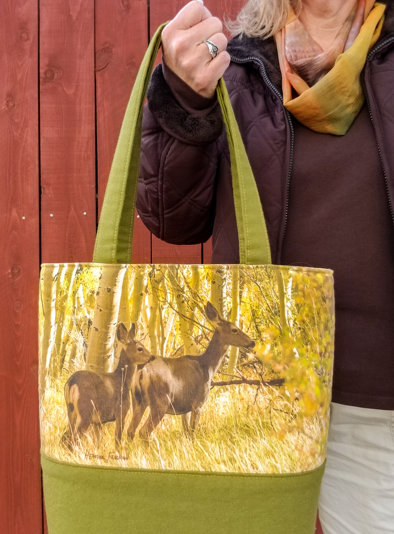 Pack up a nice picnic in this scene of foraging deer among the golden aspen trees year-round with this handmade tote bag by Wild Onion Creations