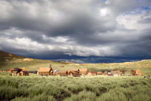 stormy clouds over abandoned high sierra bodie ghost town